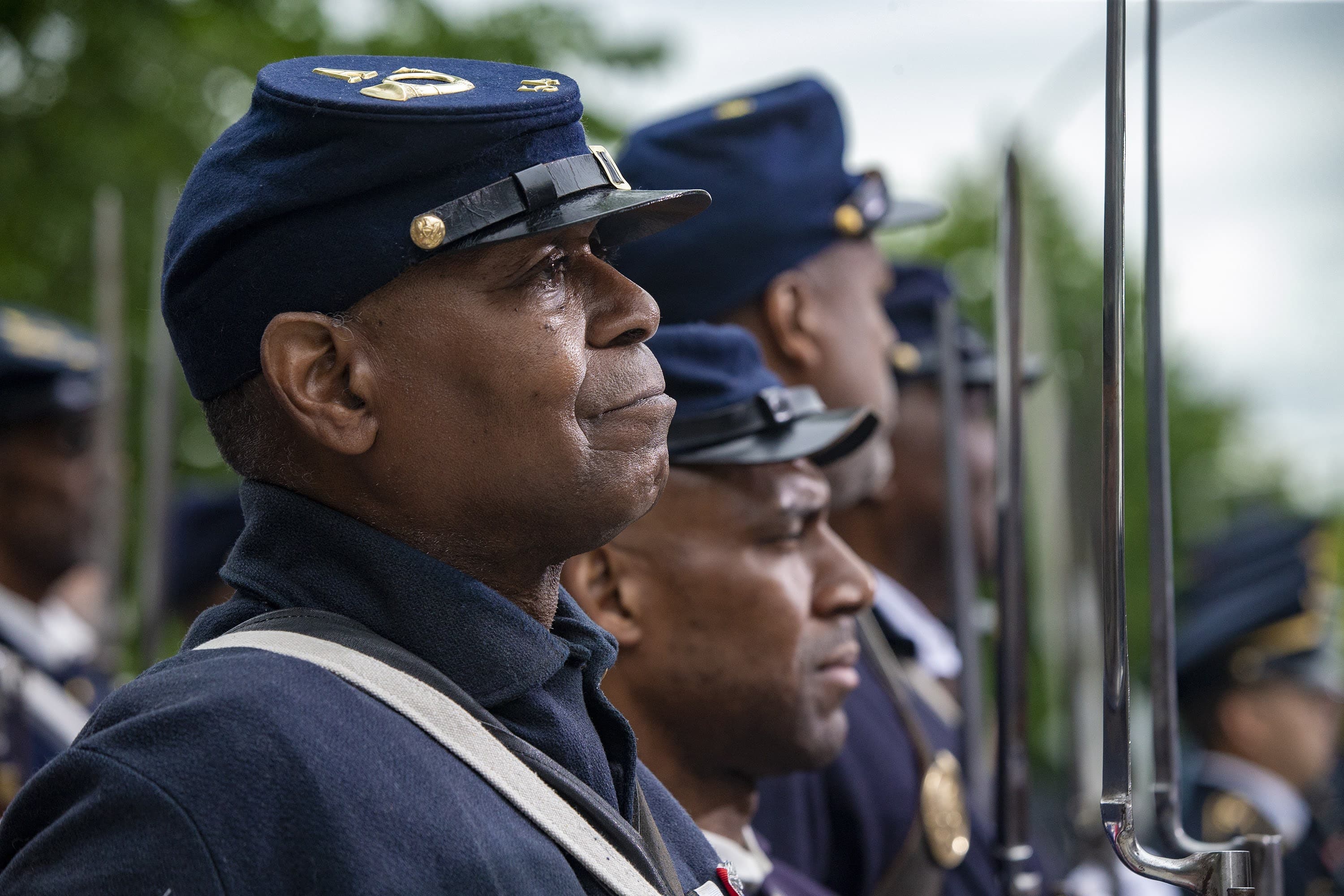Tears well in the eyes of 54th Massachusetts Regiment Volunteer Steven Paschal during the Robert Gould Shaw and the 54th Regiment Memorial rededication ceremony. (Jesse Costa/WBUR)
