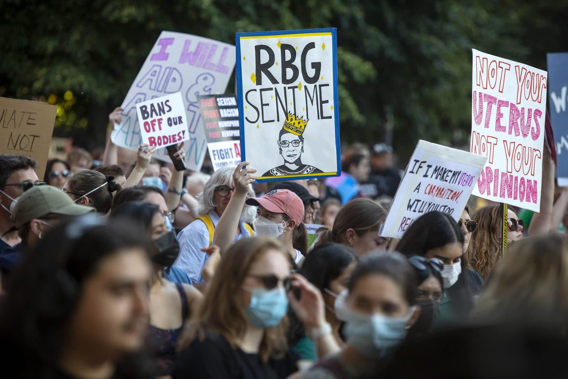 Abortion-rights protesters march through Boston on their way to a rally at the Boston Public Library. (Robin Lubbock/WBUR)