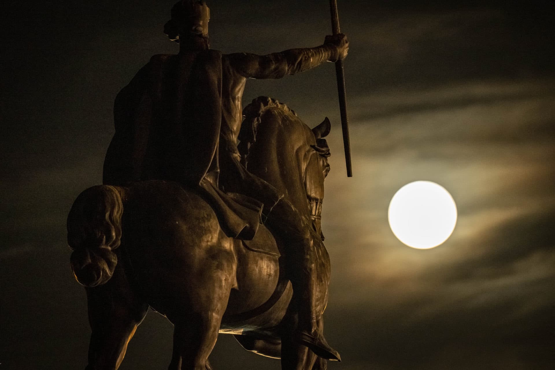 The moon rises behind sculpture of Tomislav of Croatia, the first Croatian king, in downtown Zagreb, Croatia, Tuesday. (Darko Bandic/AP)