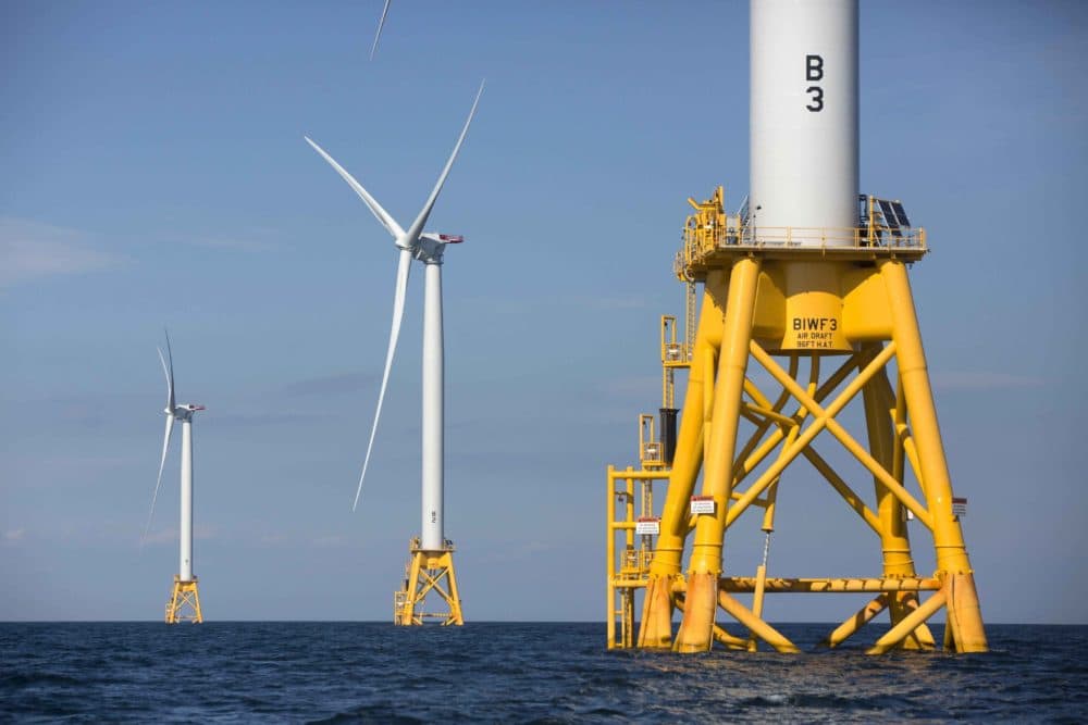 Offshore wind turbines stand near Block Island, R.I. on Aug. 15, 2016. (Michael Dwyer/AP File)