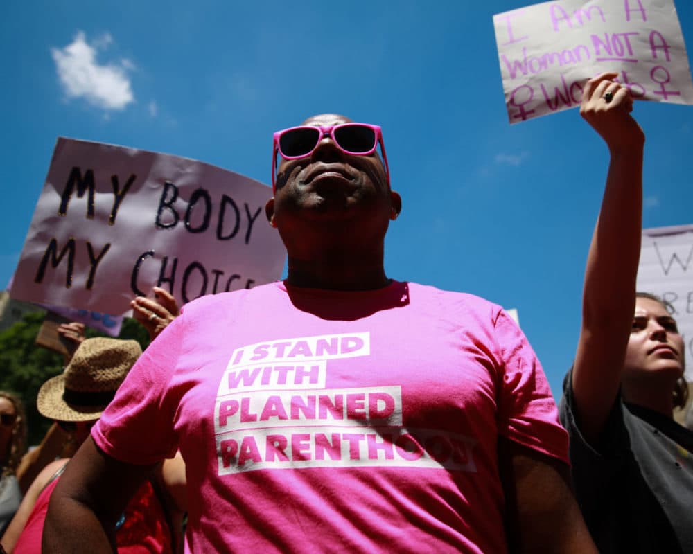 A man wears a &quot;I stand with Planned Parenthood&quot; shirt at a protest against recently passed abortion ban bills at the Georgia State Capitol building, on May 21, 2019 in Atlanta, Georgia. (Elijah Nouvelage/Getty Images)