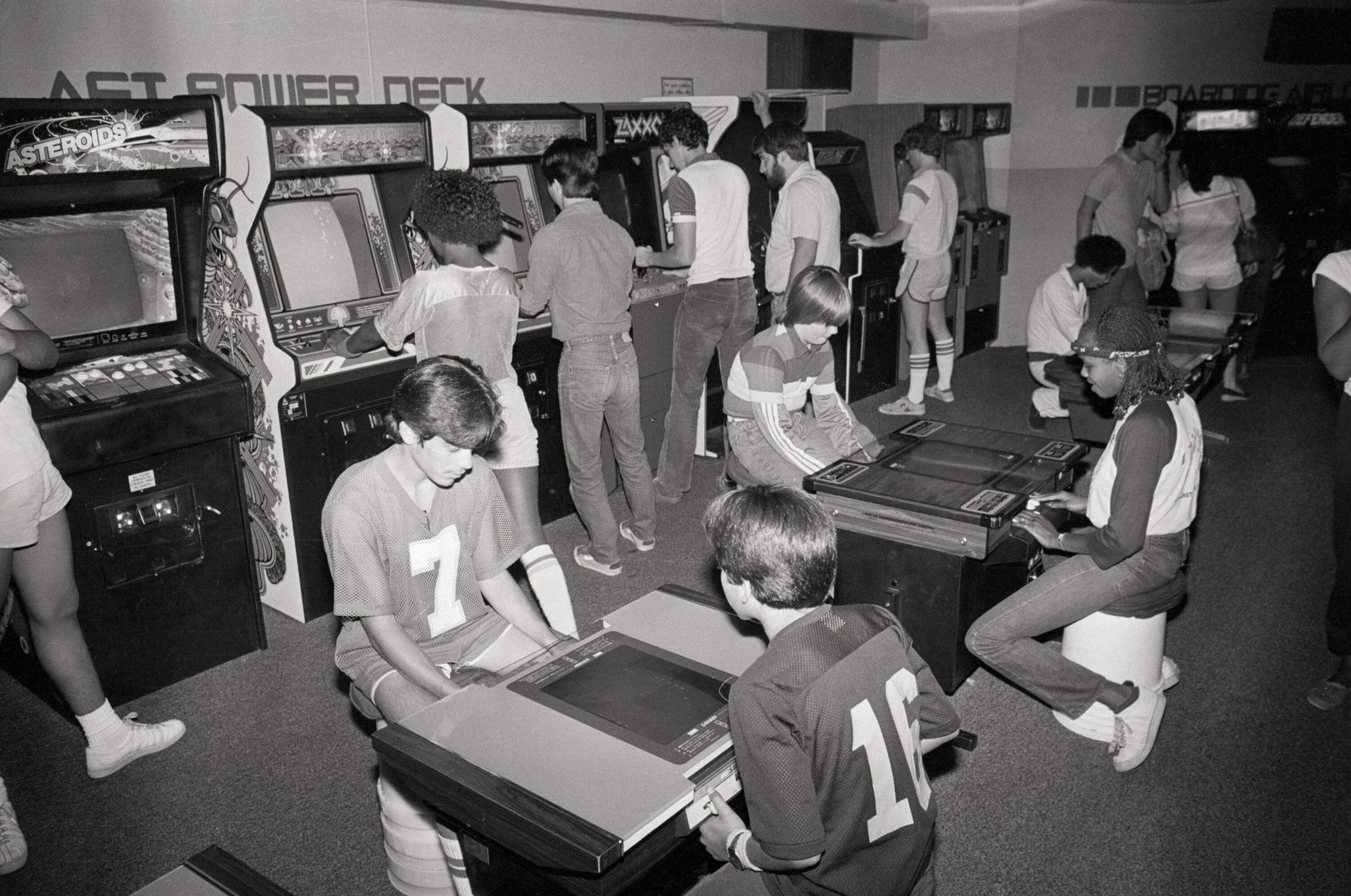 Hollywood, 7/11/82 -where kids normally went to theaters or listened to records, they are now filling videogame businesses as shown in photo, where every video screen is occupied here. The movie and record industries see the exploding video game business closing in, gobbling customers money the way the voracious Pac-Man gobbles electronic blinkets. (Image via Getty Images)