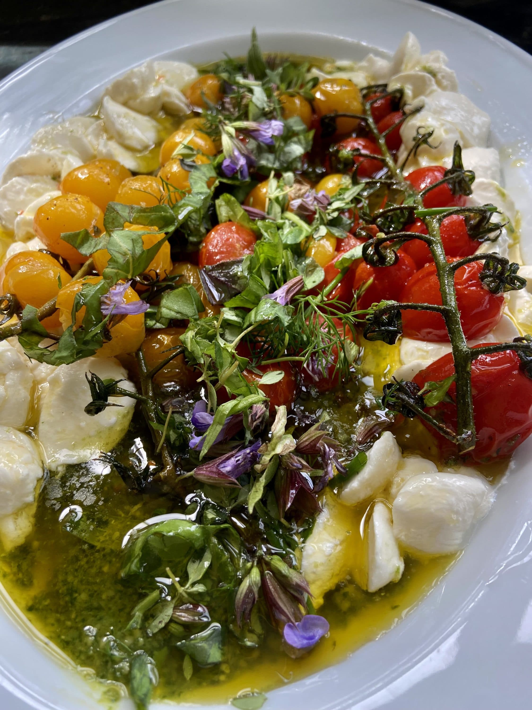 Tomato, mozzarella and herb salad. (Kathy Gunst/Here &amp; Now)