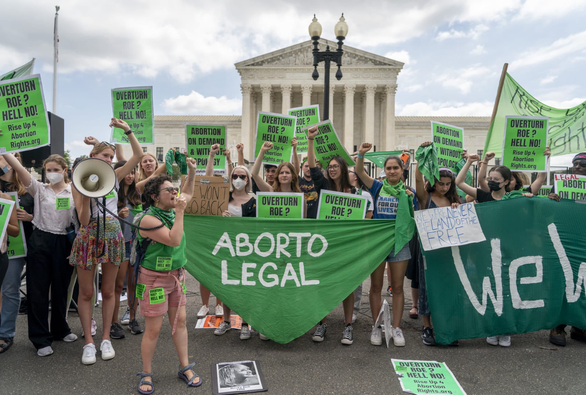 Abortion-rights protesters express themselves after the Supreme Court announced its decision Friday morning to overturn Roe v. Wade. (Gemunu Amarasinghe/AP)