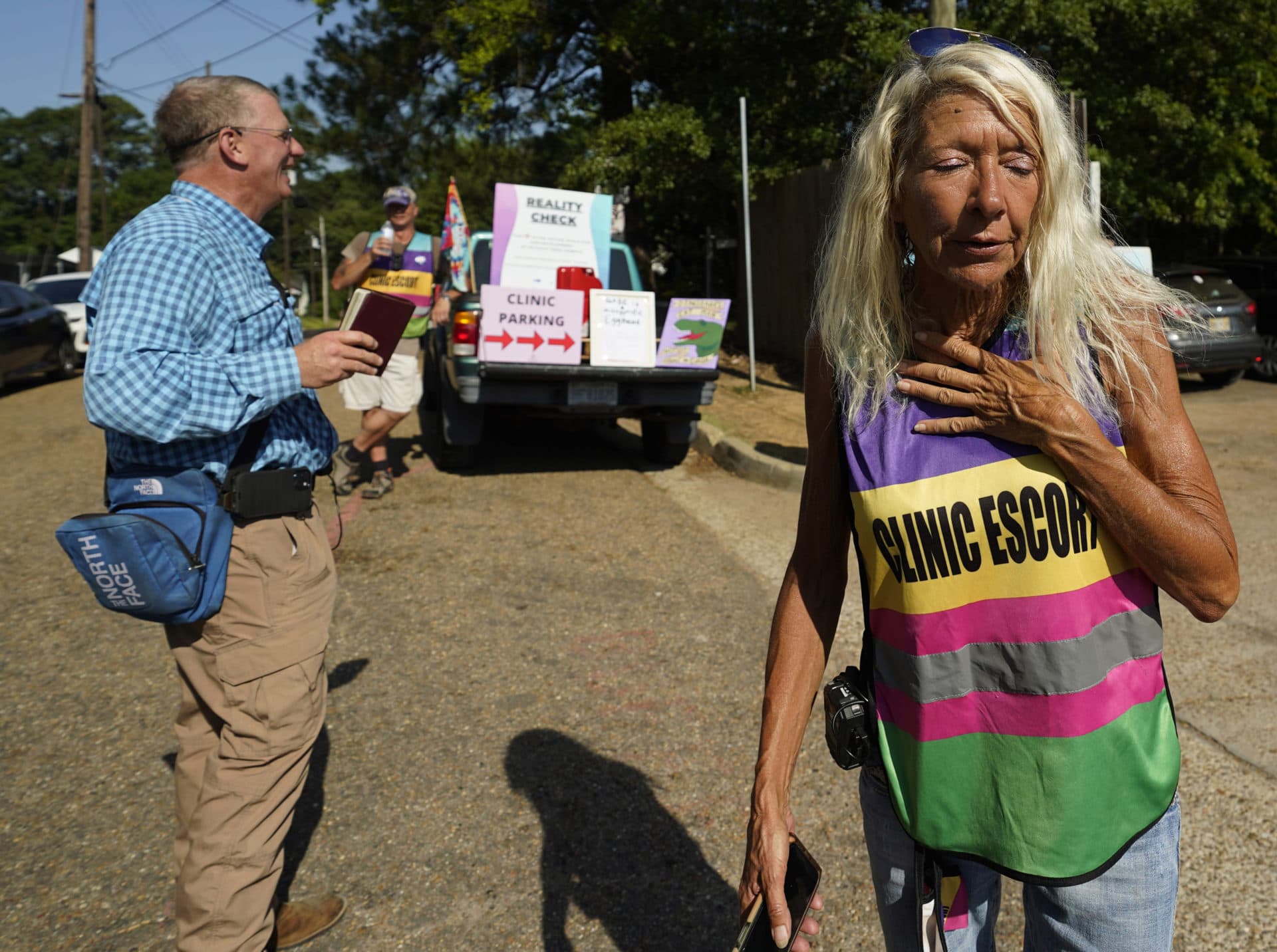 Veteran Pink House defender Derenda Hancock reacts to anti-abortion activist Coleman Boyd's protesting outside the Jackson Women's Health Organization clinic in Jackson, Mississippi moments before the U.S. Supreme Court ruling overturning Roe v. Wade was issued Friday morning. The clinic is the only facility that performs abortions in the state. (Rogelio V. Solis/AP)