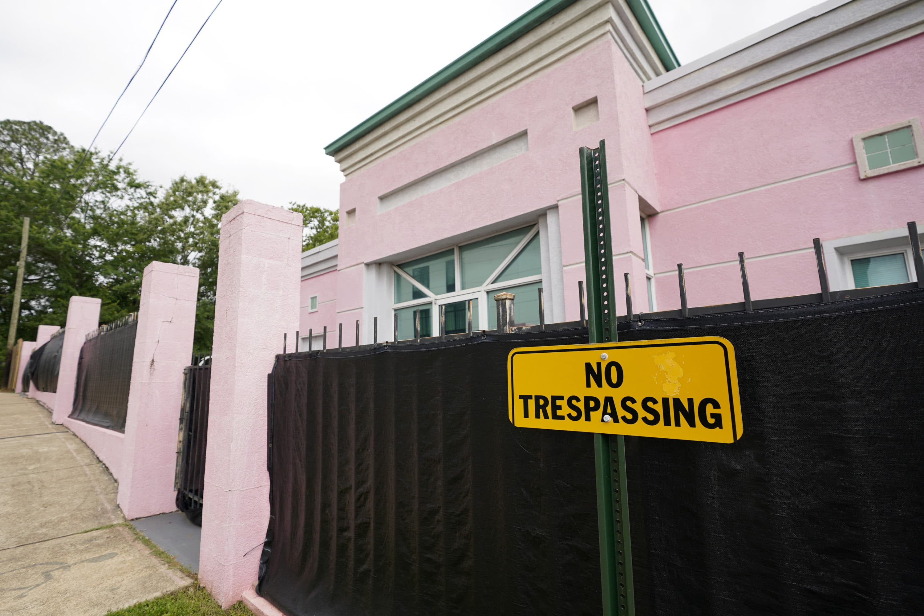 The Jackson Women's Health Organization clinic, a state-licensed abortion clinic in Jackson, Miss., is seen on May 19, 2021. Also known as "The Pink House," it is shrouded with a black tarp so that its clients may enter in privacy. (Rogelio V. Solis, AP)