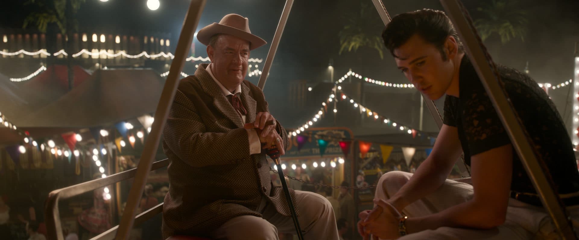 Tom Hanks as Colonel Tom Parker and Austin Butler as Elvis in &quot;Elvis.&quot; (Courtesy Warner Bros. Pictures)