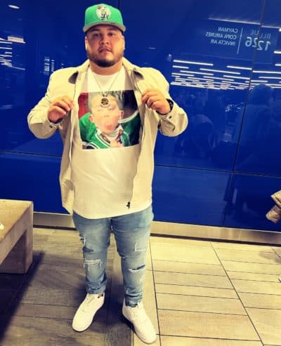 Angel Calderon of Roslindale displays his Celtics pride, with a T-shirt showing star Jayson Tatum's son. (Courtesy Angel Calderon