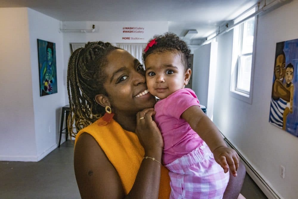 Artist Valerie Imparato and her daughter Zoe at the Washington Street Art Gallery in Somerville. (Jesse Costa/WBUR)