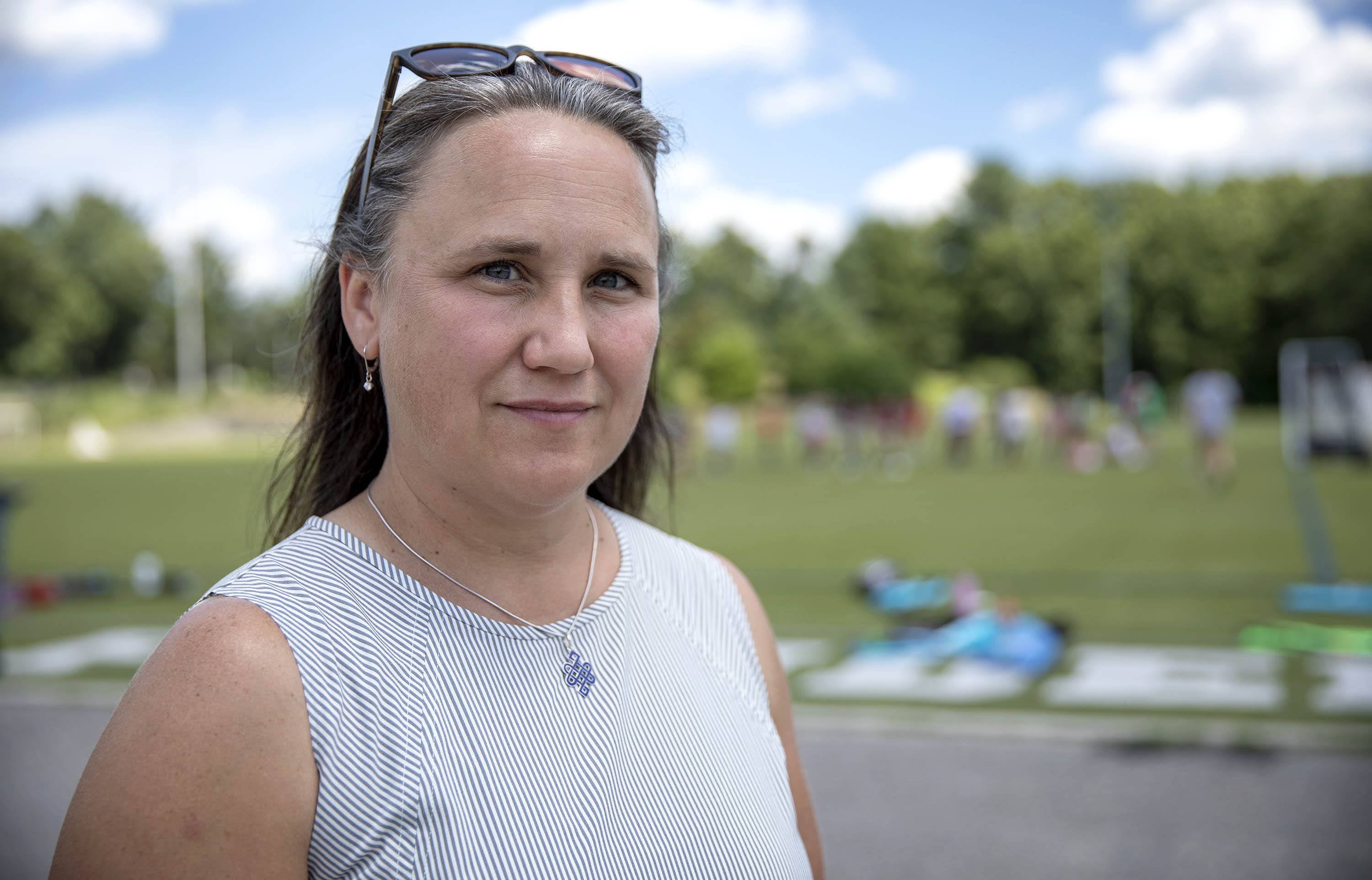 Dr. Hillary Irons, in DeFazio Park in Needham, on a hot summer day. (Robin Lubbock/WBUR)
