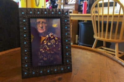 A framed photograph of the late Eleanor Lollis inside the home she and her daughter, Katherine, shared together. (Lynn Jolicoeur/WBUR)