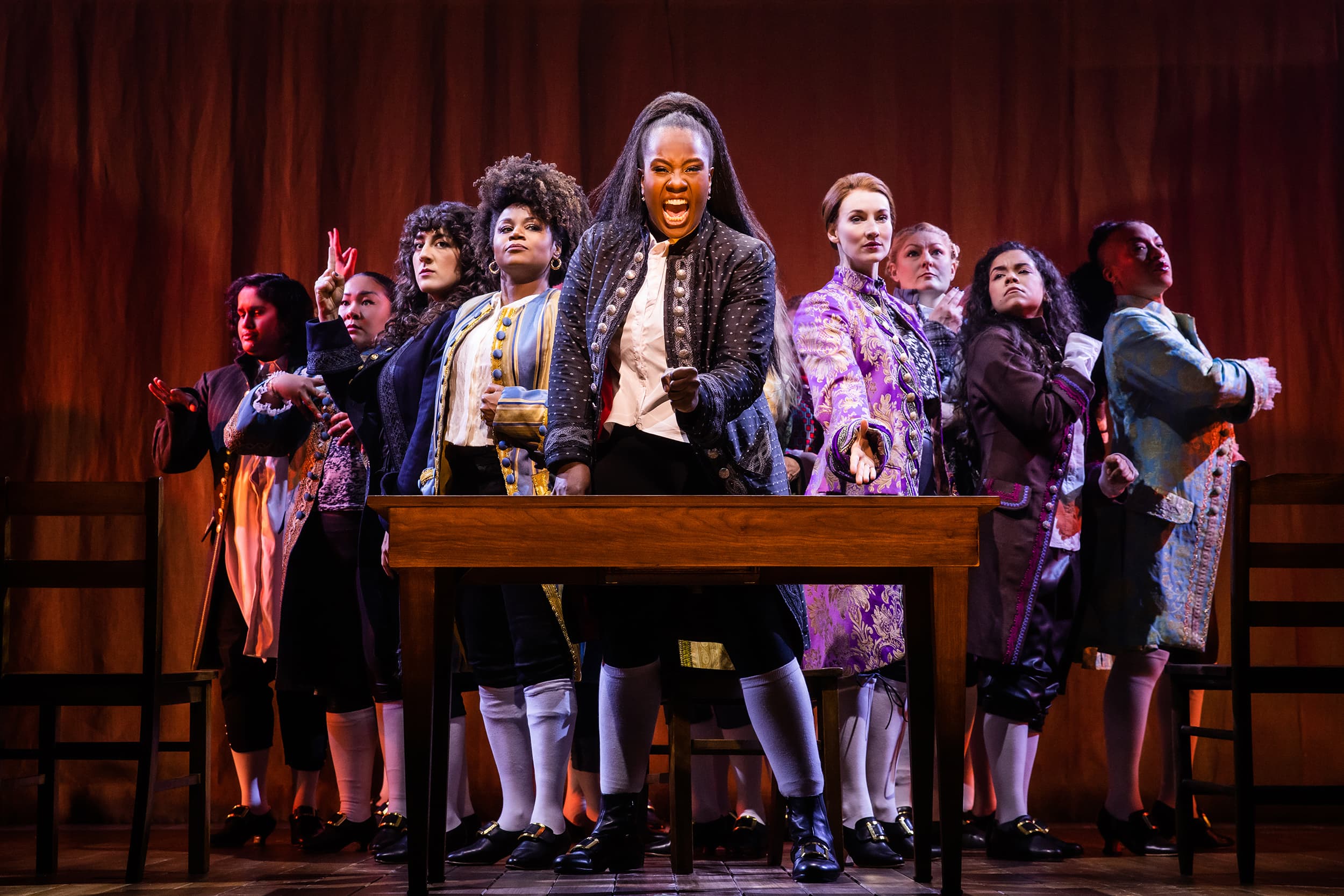 Left to right: Sushma Saha, Sara Porkalob, Mehry Eslaminia, Gisela Adisa, Crystal Lucas-Perry, Elizabeth A. Davis, Becca Ayers, Brooke Simpson and Oneika Phillips in the American Repertory Theater's production of &quot;1776.&quot; (Courtesy Evan Zimmerman for Murphy Made)