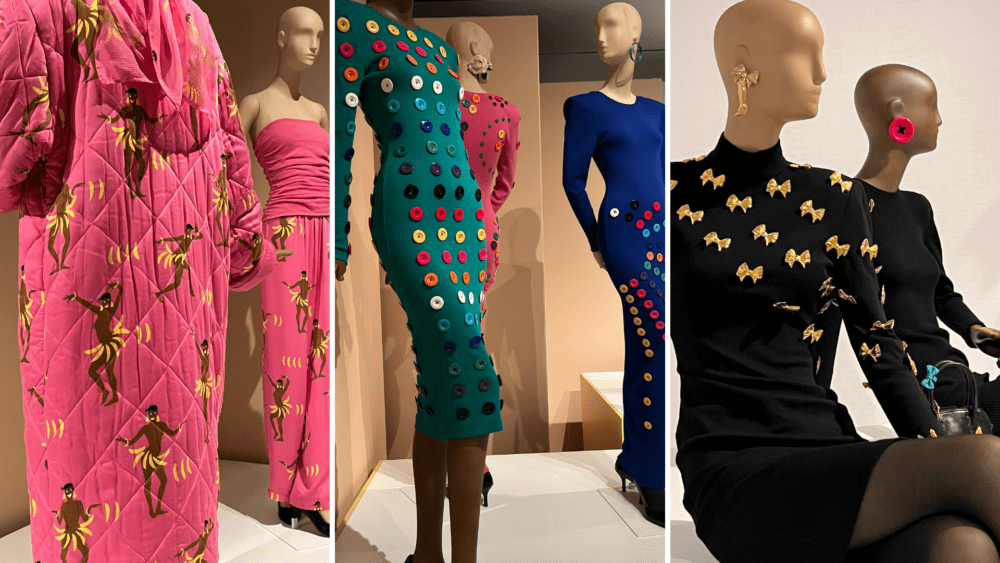 From left to right: a pink coat and two-piece ensemble made of fabric printed with the image of Josephine Baker. These colorful dresses sported mismatched buttons, recalling Kelly's youth. Gold bows adorn a black dress. (Arielle Gray/ WBUR)