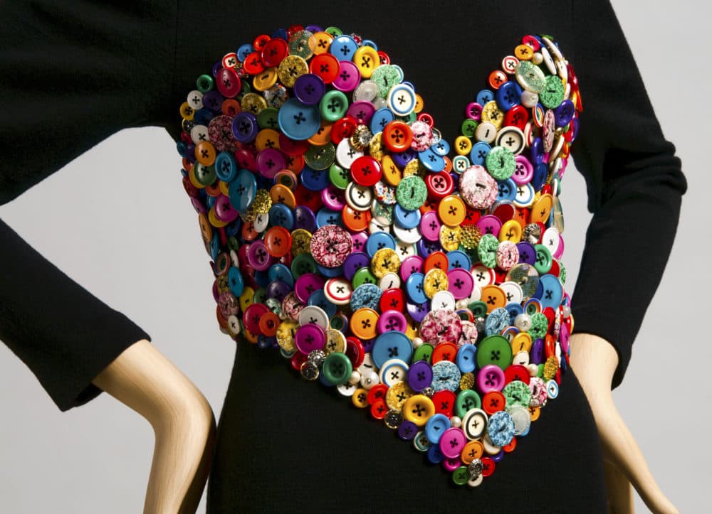Designed by Patrick Kelly, American (active Paris), 1954–1990 Woman's Dress (detail), Fall/Winter 1986-87 Wool and spandex knit, plastic buttons Philadelphia Museum of Art: Gift of Bjorn Guil Amelan and Bill T. Jones in honor of Monica Brown, 2015-201-124 Image Courtesy of the Philadelphia Museum of Art