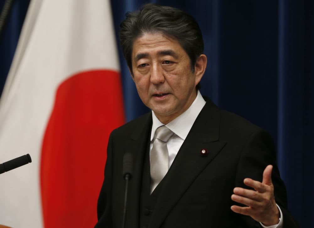 Shinzo Abe speaks during his first press conference at the prime minister's official residence in 2012. (Shizuo Kambayashi/AP)