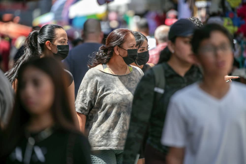 Sustained jumps in cases and hospitalizations fueled by the hyper-infectious BA.5 subvariant pushed Los Angeles County into the high COVID-19 community level Thursday, a shift that could trigger a new public indoor mask mandate by the end of this month unless conditions improve.(Irfan Khan / Los Angeles Times via Getty Images)