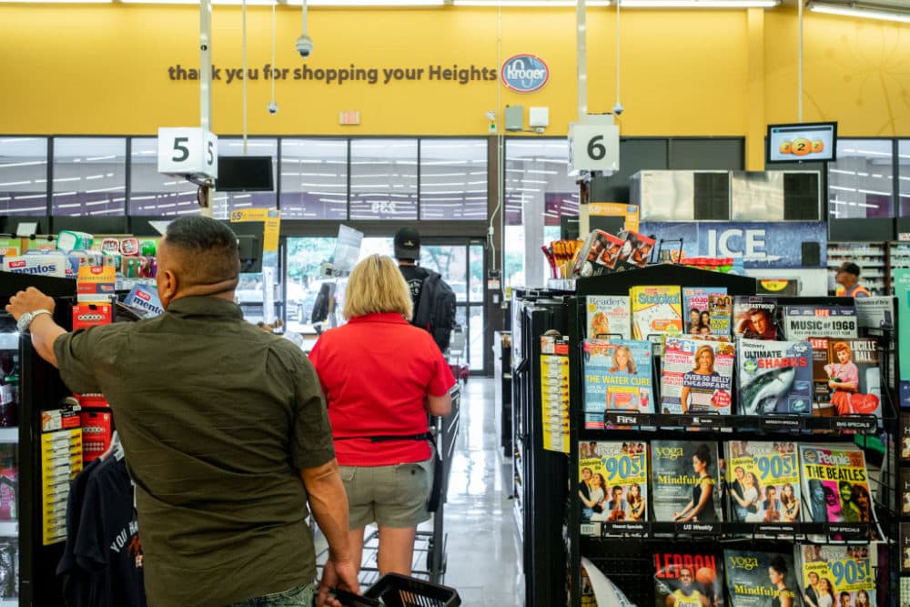 Customers wait in line at a Kroger grocery store on July 15, 2022 in Houston, Texas. (Brandon Bell/Getty Images)