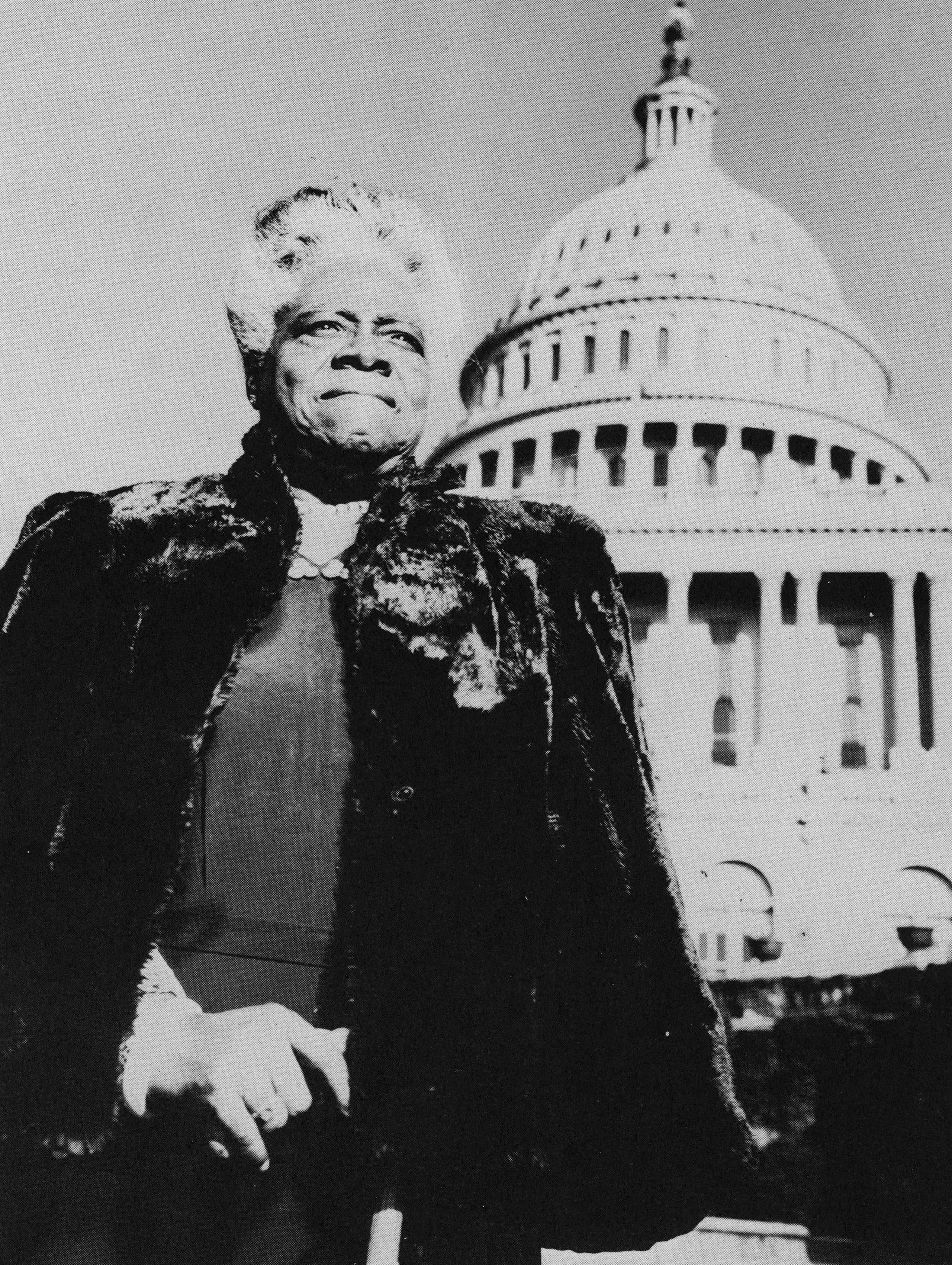 Portrait of American educator and activist Mary McLeod Bethune with the United States Capitol Building in the background. (Hulton Archive/Getty Images)