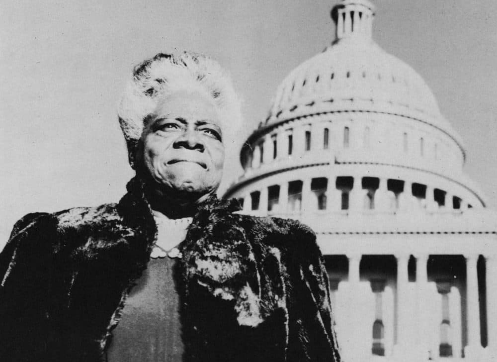 Portrait of American educator and activist Mary McLeod Bethune with the United States Capitol Building in the background. (Hulton Archive/Getty Images)