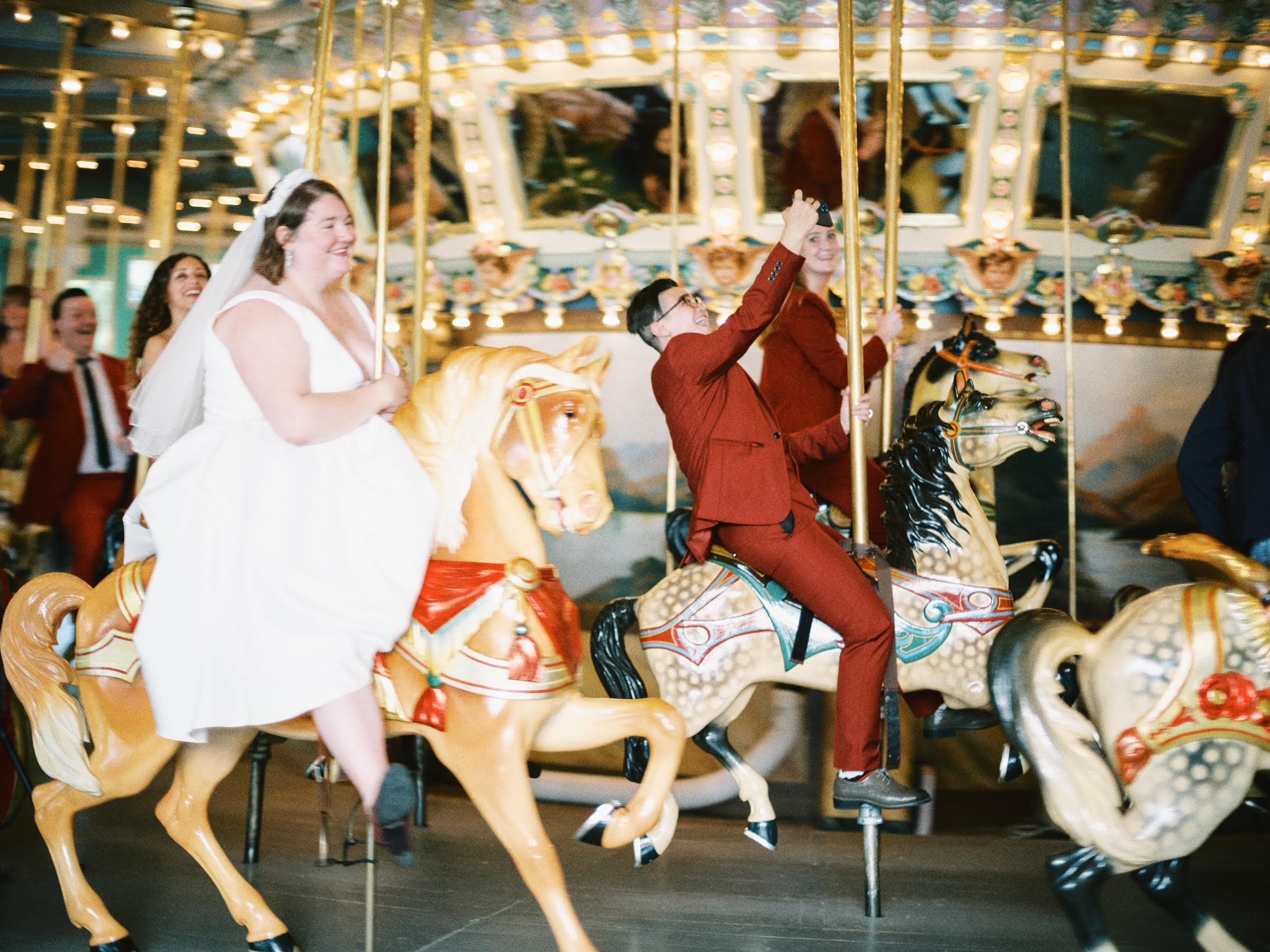 KJ Morans, left, and Aria Velz, right, riding a carousel. (Courtesy of Aria Velz)