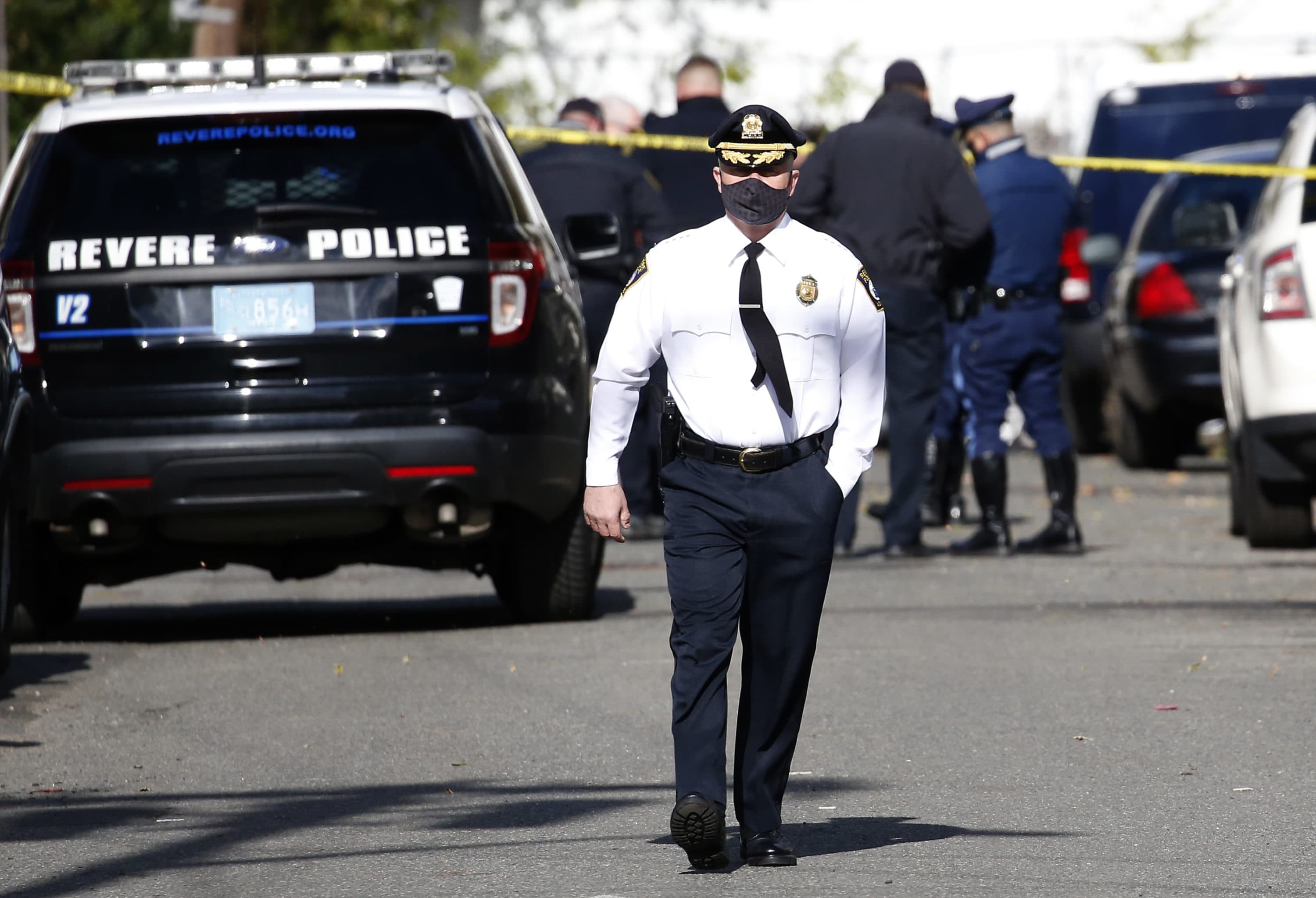 Revere Police Chief David Callahan walks down Witt Street in Lynn, Mass. in November, 2020. (Jessica Rinaldi/The Boston Globe via Getty Images)