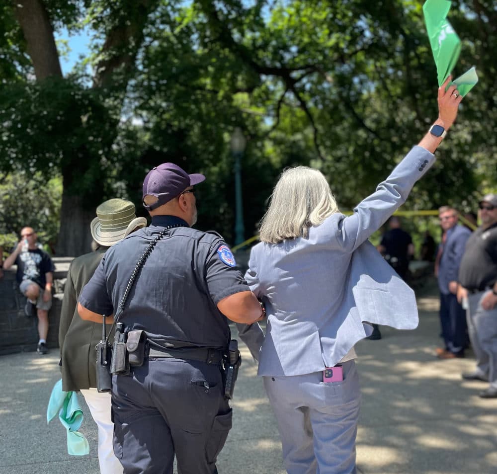 Congresswoman Katherine Clark tweeted out a photo of her arrest Tuesday at a protest outside the Supreme Court over abortion rights. (Screenshot via Katherine Clark's Twitter account)