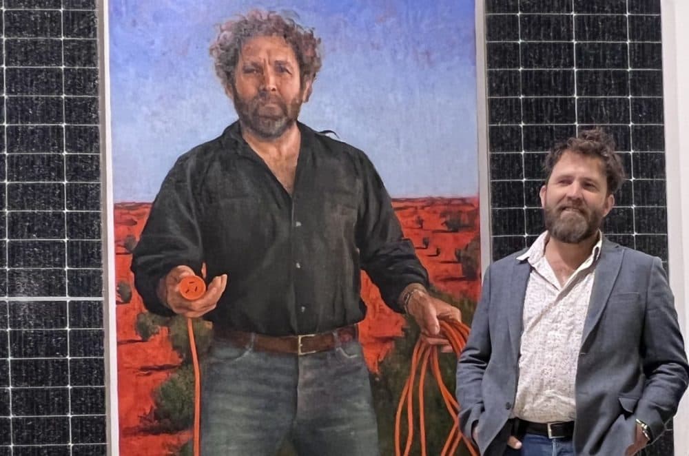 A painting of Saul Griffith mounted on a solar panel was a finalist in this year's Archibald Prize, a prestigious Australian portrait contest competition features paintings of prominent Australians. (Danny Kennedy)