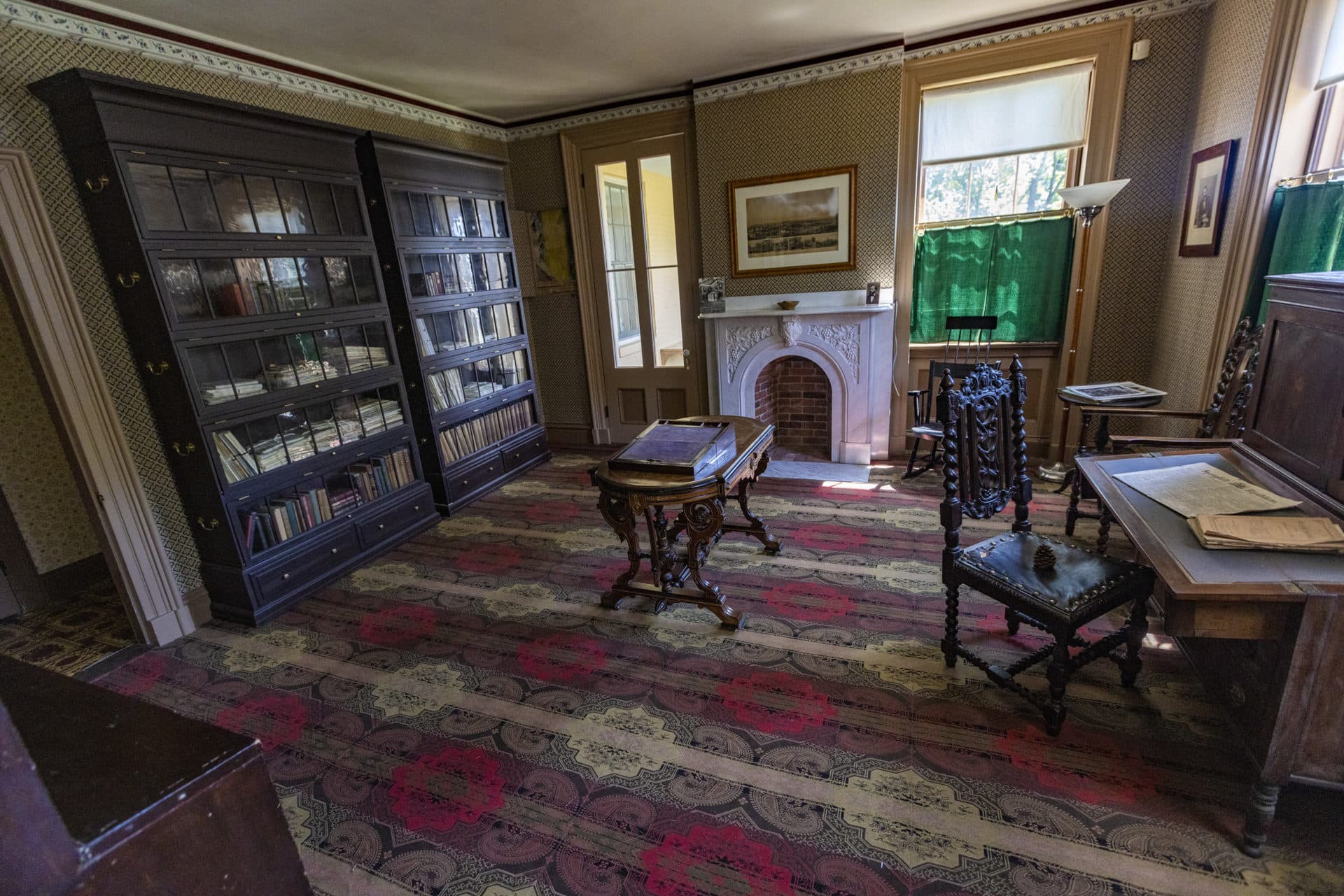 The study at Emily Dickinson's home-museum looks more alive with the bookcases and paper used on set while filming the Apple TV+ series.  (Jesse Costa/WBUR)