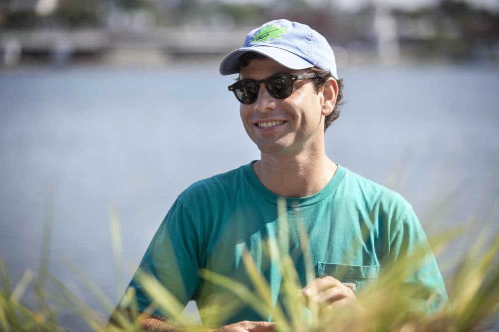 Emerald Tutu project lead Gabriel Cira, by a test module destined for Chelsea Creek. (Robin Lubbock/WBUR)