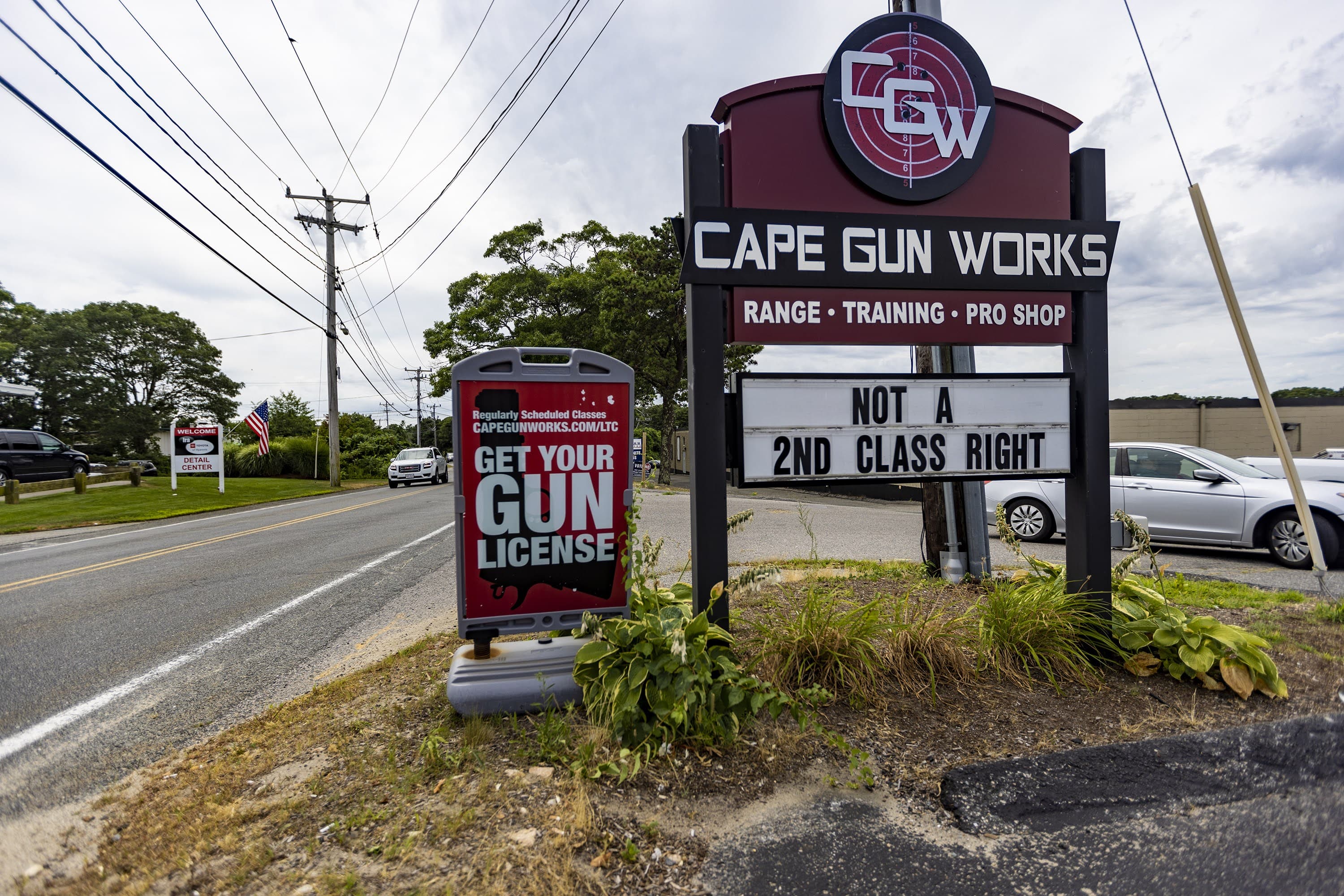 The sign in front of Cape Gun Works in Hyannis. (Jesse Costa/WBUR)