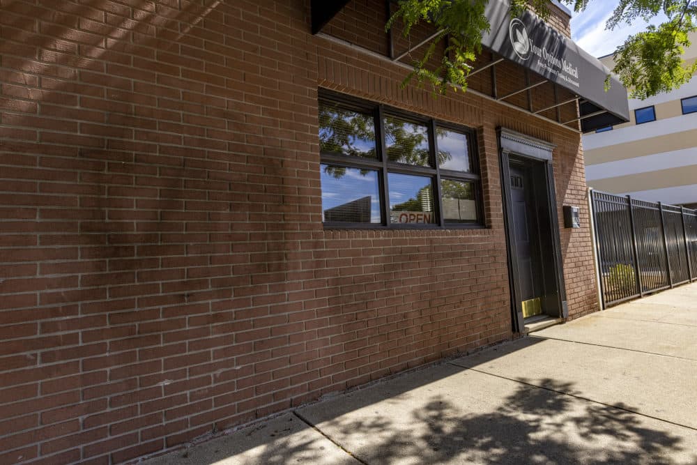 The outside of Your Options Medical, a crisis pregnancy center in Revere, still has remnants of recent vandalism. (Jesse Costa/WBUR)