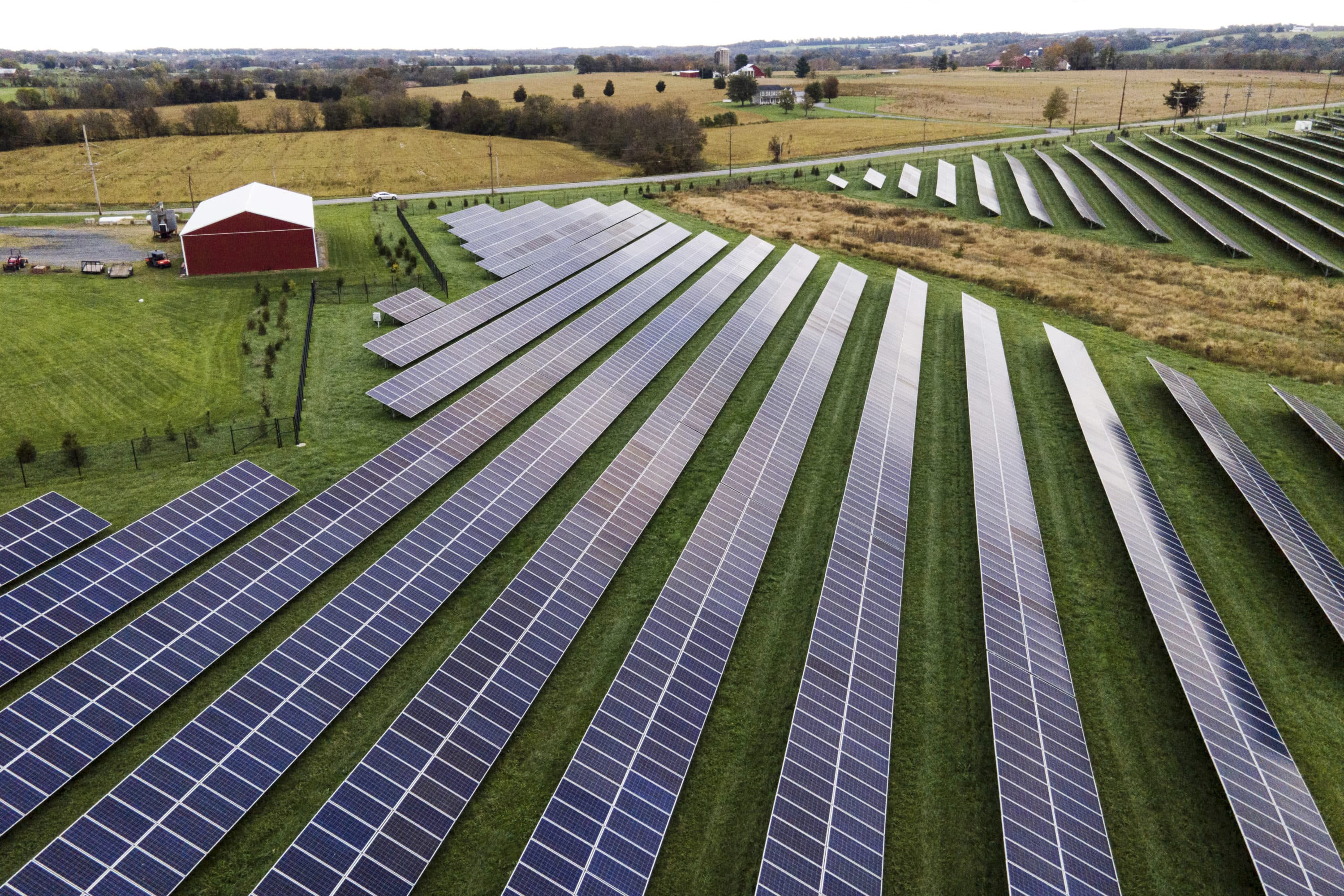 Farmland is seen with solar panels from Cypress Creek Renewables, Oct. 28, 2021, in Thurmont, Maryland. (Julio Cortez/AP)