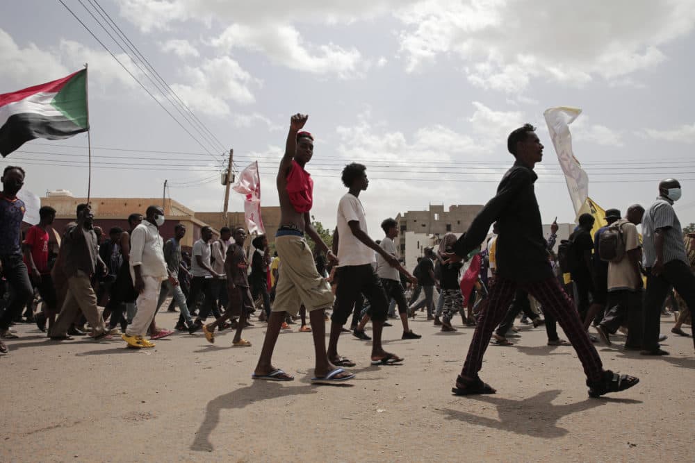 Sudanese demonstrators take to the streets calling for civilian rule and denouncing the military administration. (Marwan Ali/AP)