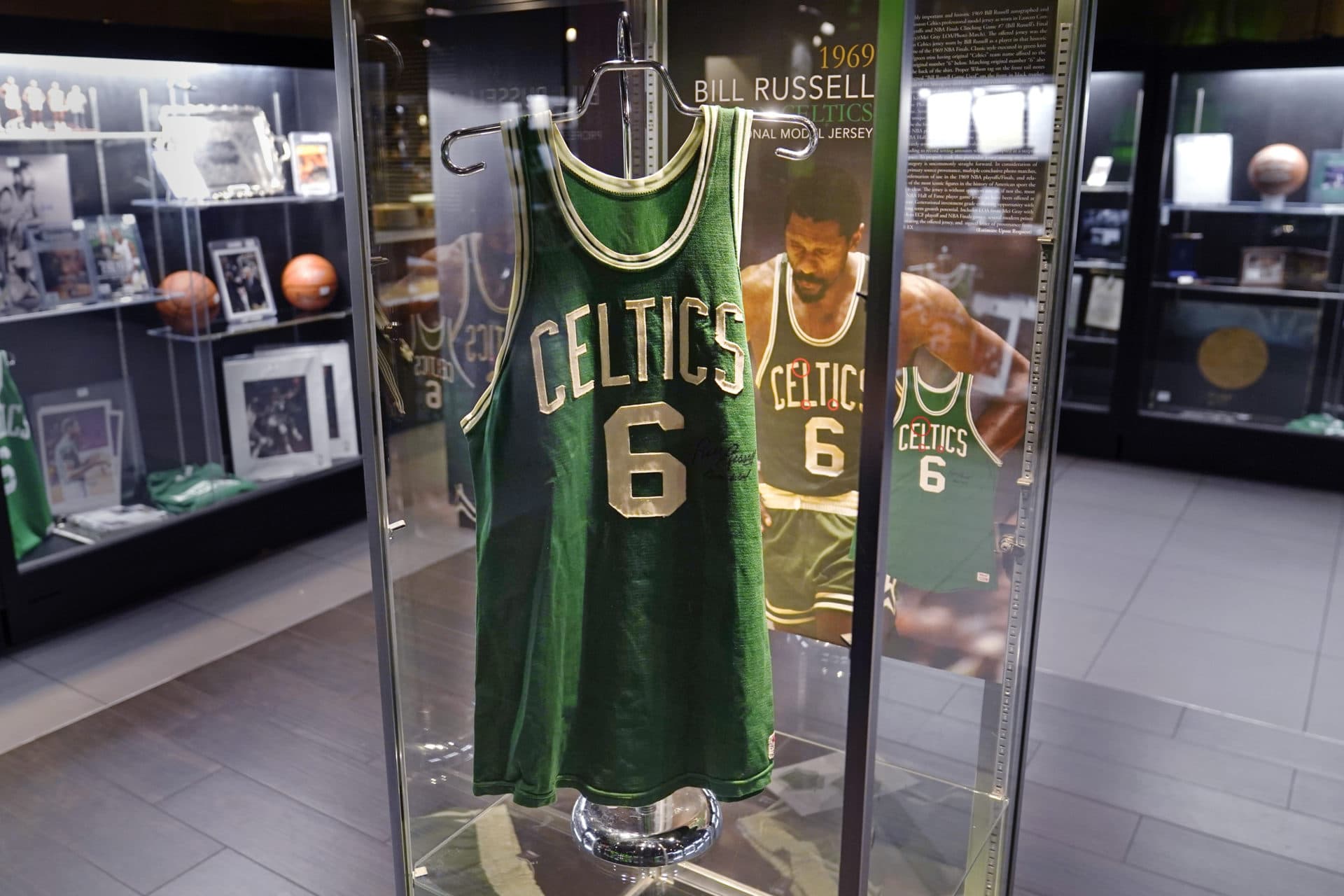 The 1969 game worn jersey of Boston Celtics' legend Bill Russell is displayed along with other memorabilia for auction in 2021 in Boston. (Charles Krupa/AP)