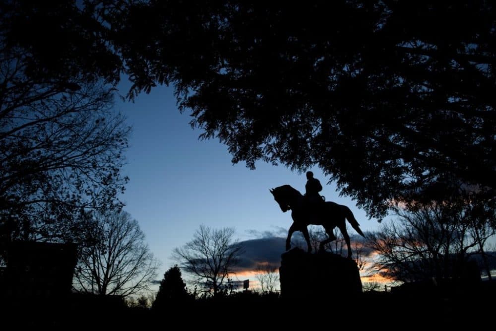 A statue of Confederate General Robert Edward Lee is seen in Market Street Park during the first day of jury selection for James Fields's murder trial at the Charlottesville Circuit Court, November 26, 2018 in Charlottesville, Virginia. (Brendan Smialowski /AFP via Getty Images)