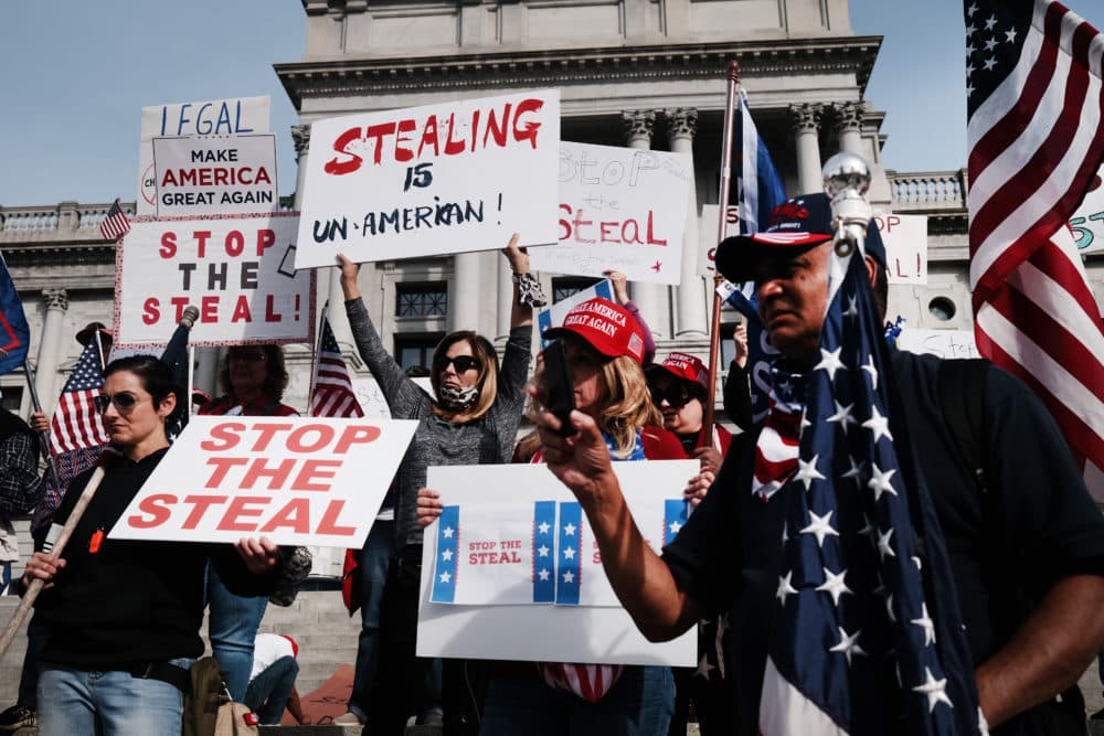 Dozens of people calling for stopping the vote count in Pennsylvania due to alleged fraud against former President Donald Trump gather on the steps of the State Capital on November 05, 2020 in Harrisburg, Pennsylvania. (Spencer Platt/Getty Images)