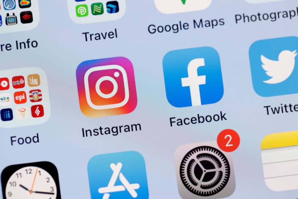In this photo illustration, the Facebook and Instagram apps are seen on the screen of an iPhone on October 04, 2021 in San Anselmo, California. (Justin Sullivan/Getty Images)