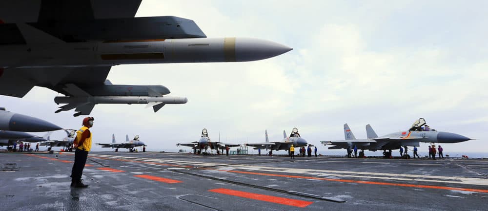 This undated photo taken in April 2018 shows J15 fighter jets on China's sole operational aircraft carrier, the Liaoning, during a drill at sea.  (Photo credit should read -/AFP via Getty Images)