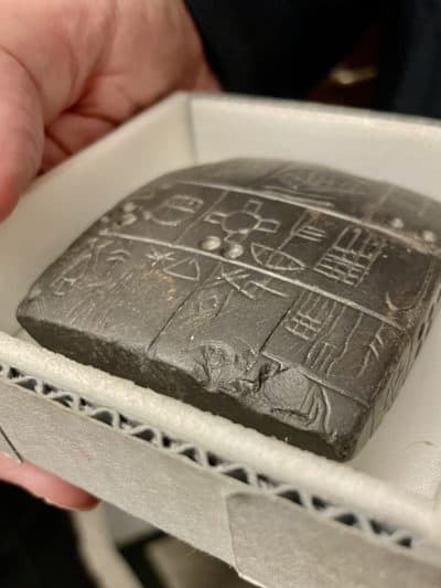 This tablet dates to around 2900 B.C.E., the oldest in the Penn Museum’s collection. (WBUR/Ben Brock Johnson)