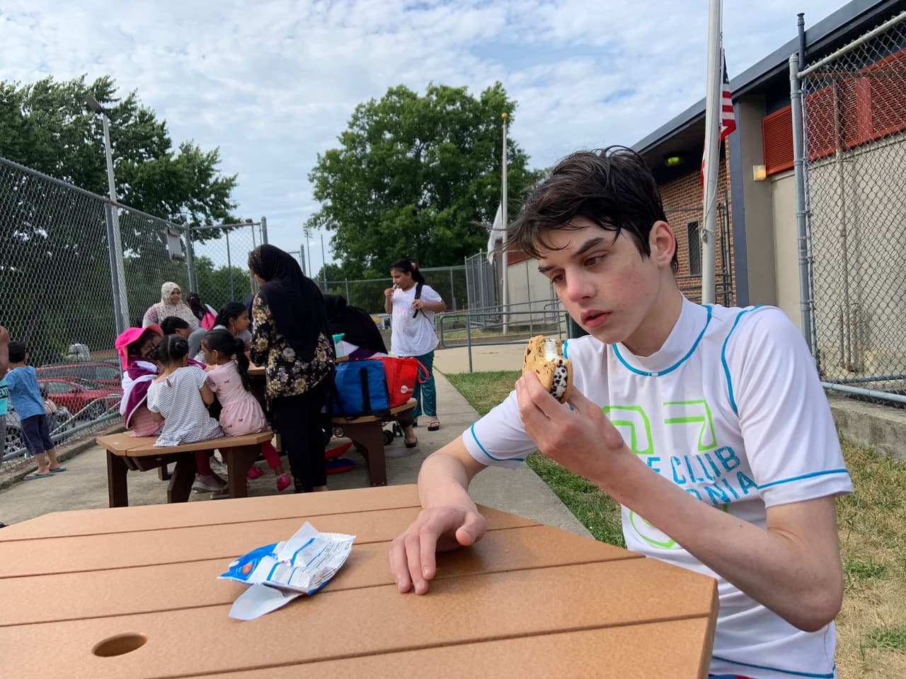 The author's son, Finn, enjoys a Chipwich (his favorite ice cream truck treat) at Dilboy Pool in Somerville, Mass. (Courtesy Alysia Abbott)