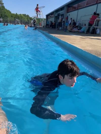 The author's son, Finn, enjoys the water at Dilboy Pool in Somerville, Mass. (Courtesy Alysia Abbott)