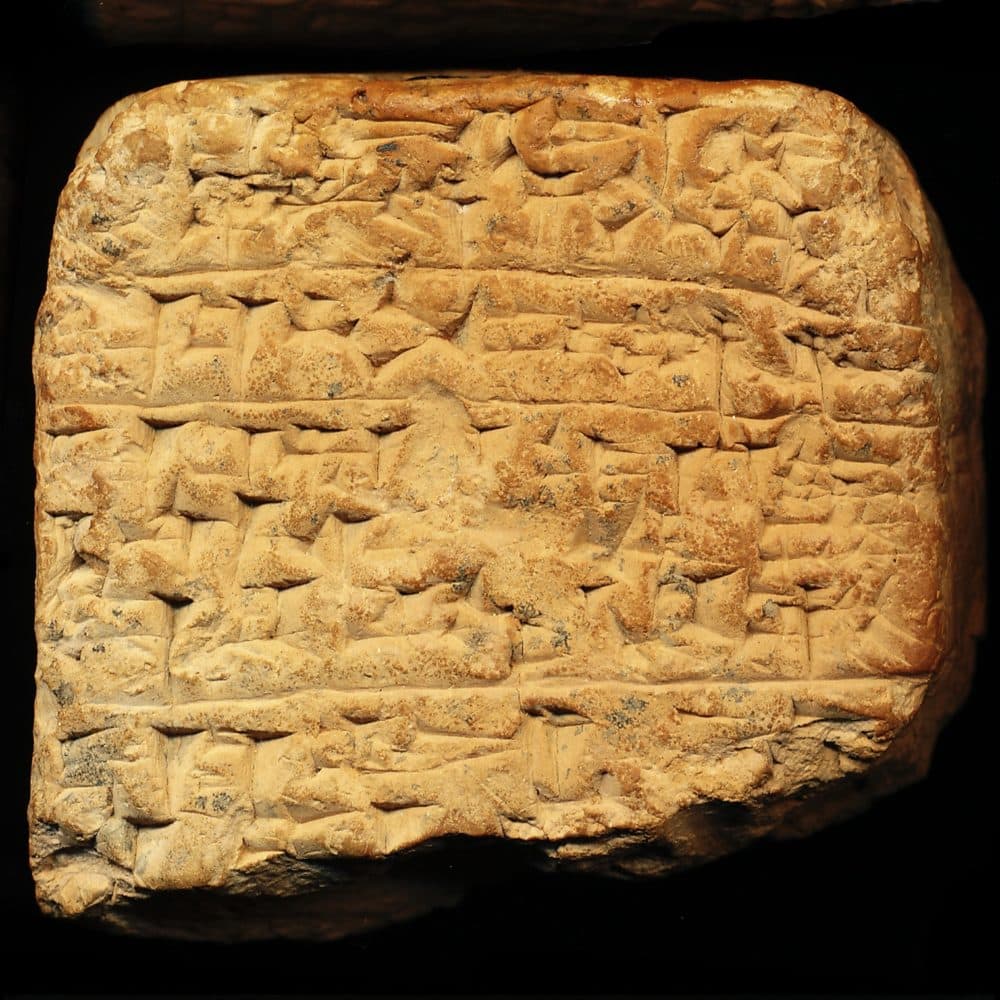 An ancient tablet with a Sumerian bar joke. In English, it translates as, “A dog walks into a bar and says, ‘I cannot see a thing. I’ll open this one.’” (Courtesy of the Penn Museum/Cuneiform Digital Library Initiative)