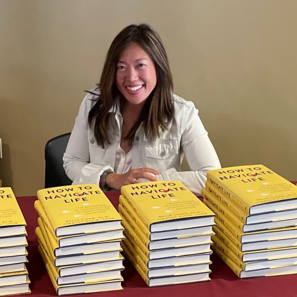 Belle Liang with copies of the book. (Courtesy of Belle Liang)