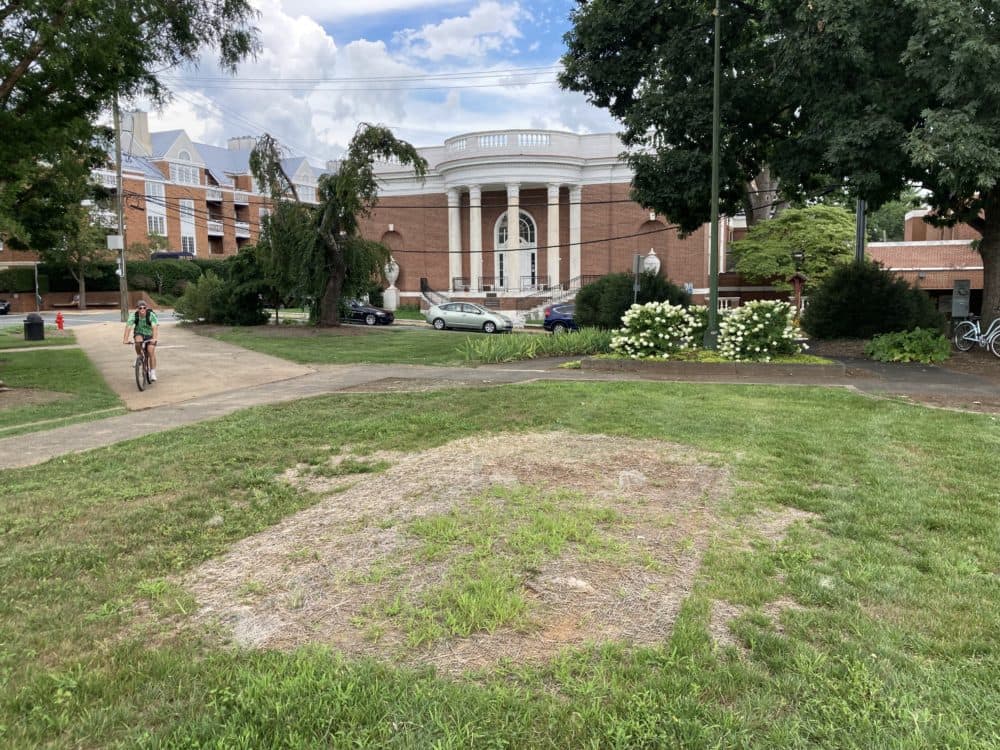 A patch of dead grass marks where the Robert E. Lee statue once stood. The statue’s fate is currently tied up in the courts. (Hawes Spencer)