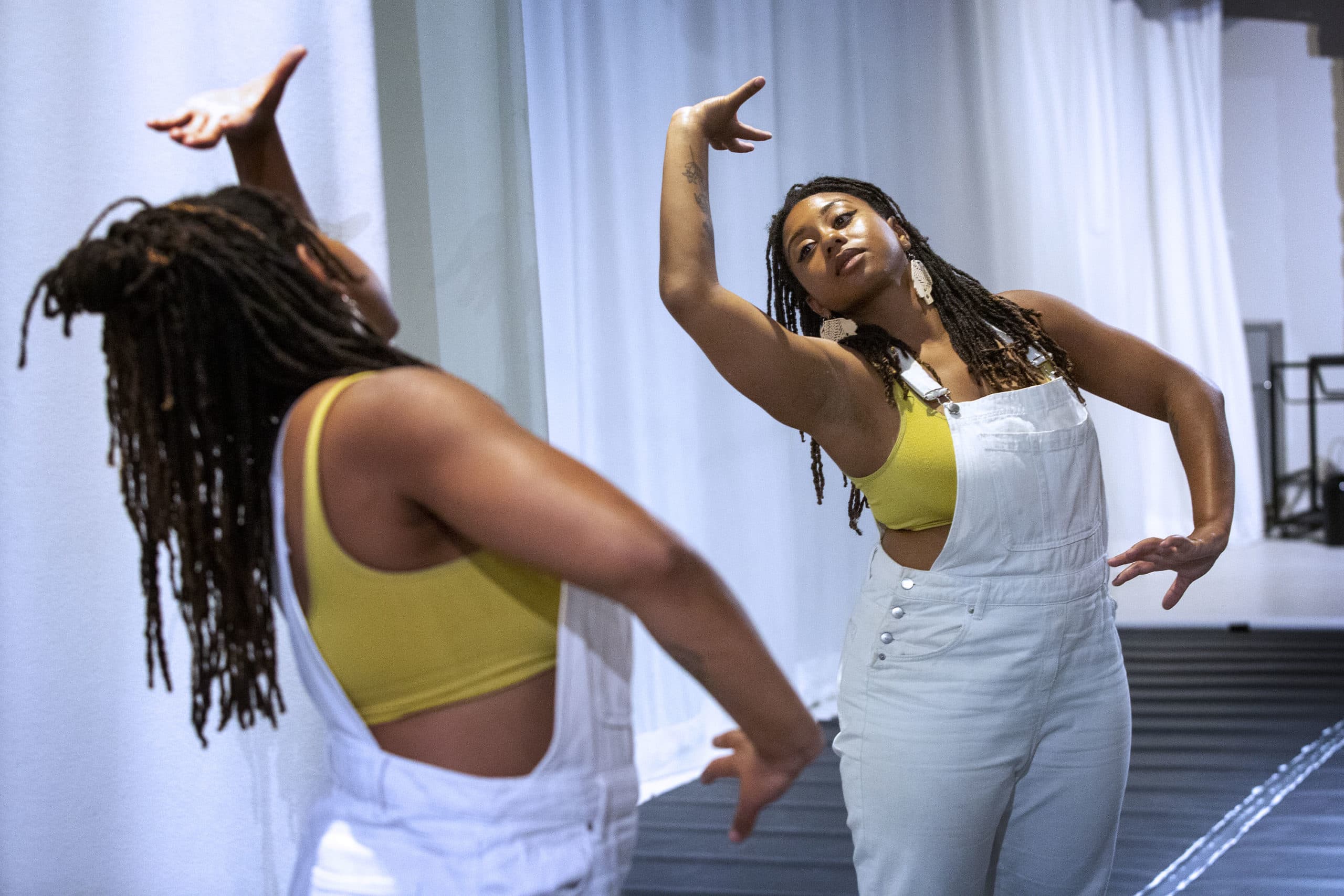 VLA DANCE director and choreographer Victoria Lynn Awkward works through some dance moves at Midway Artist Studios in Boston. (Robin Lubbock/WBUR)