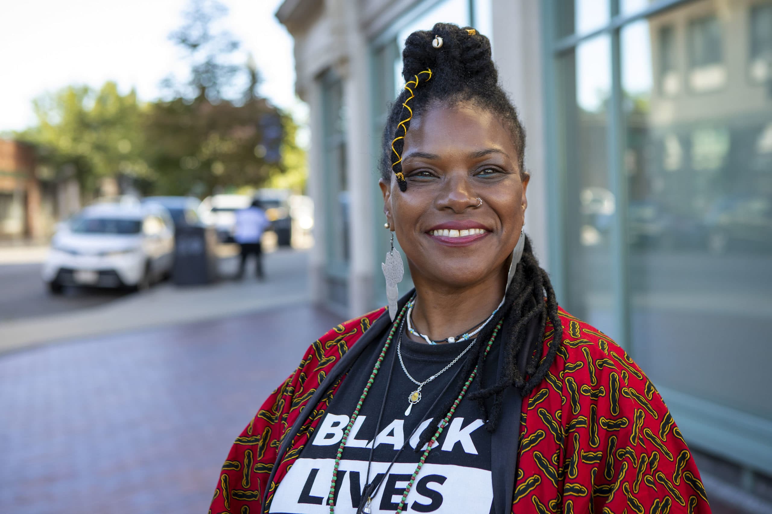 Artist, poet, writer and community organizer Yvette Modestin in Nubian Square. (Robin Lubbock/WBUR)