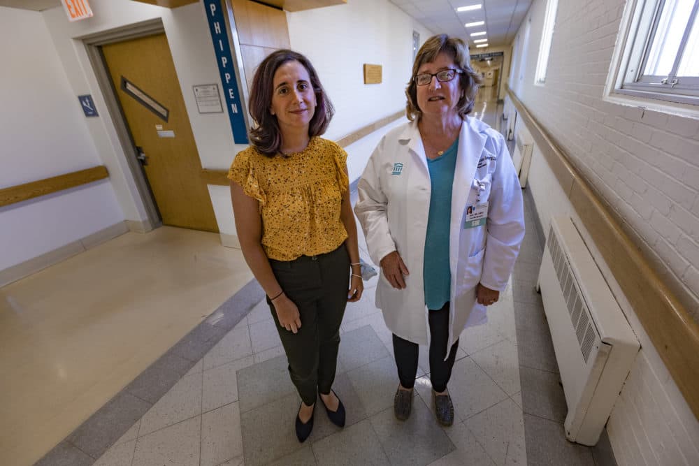 Former director of substance use services at Salem Hospital Liz Tadie, left, and social worker Jean Monahan-Doherty. (Jesse Costa/WBUR)