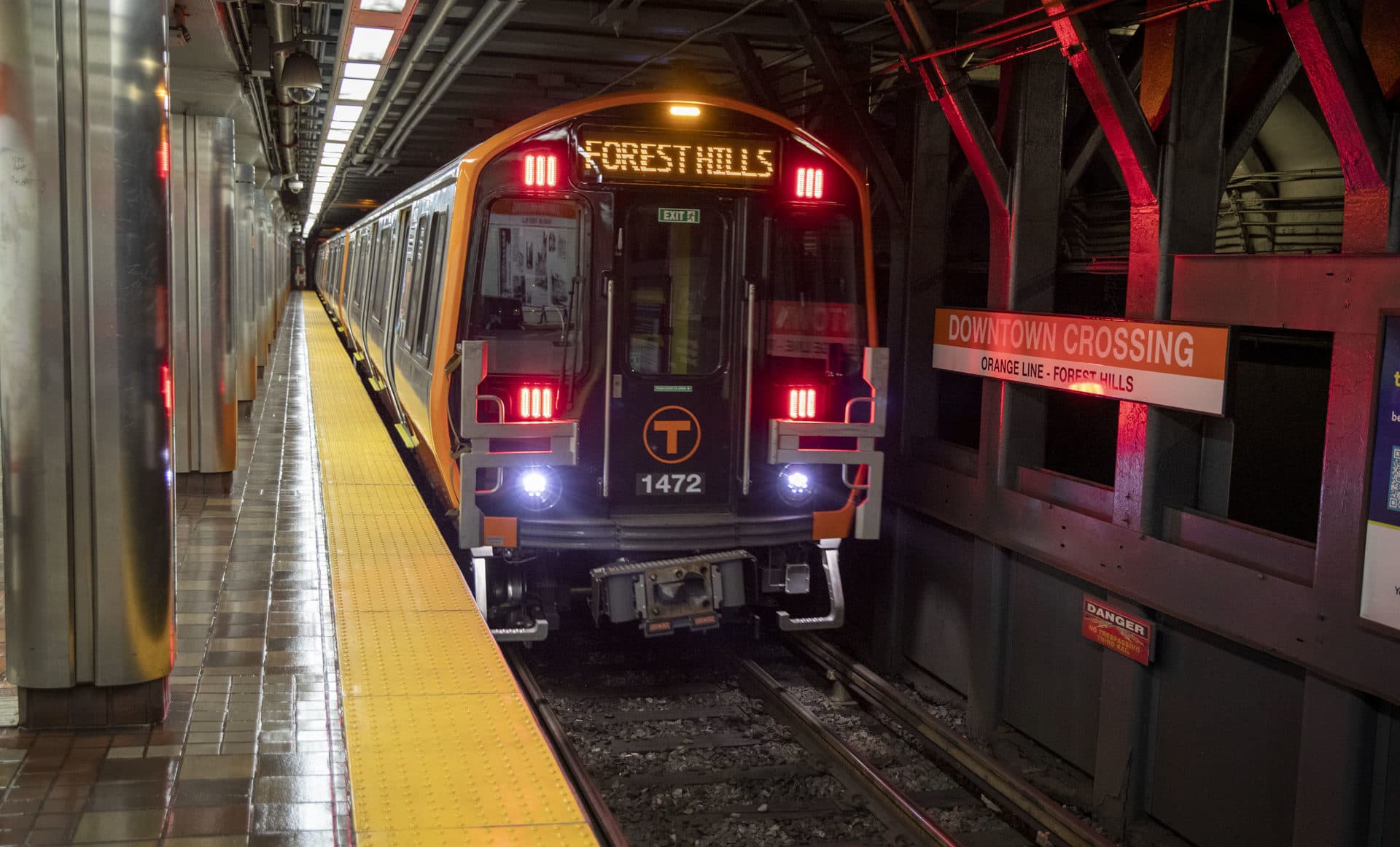 An Orange Line MBTA train pulls into Downtown Crossing. (Robin Lubbock/WBUR)