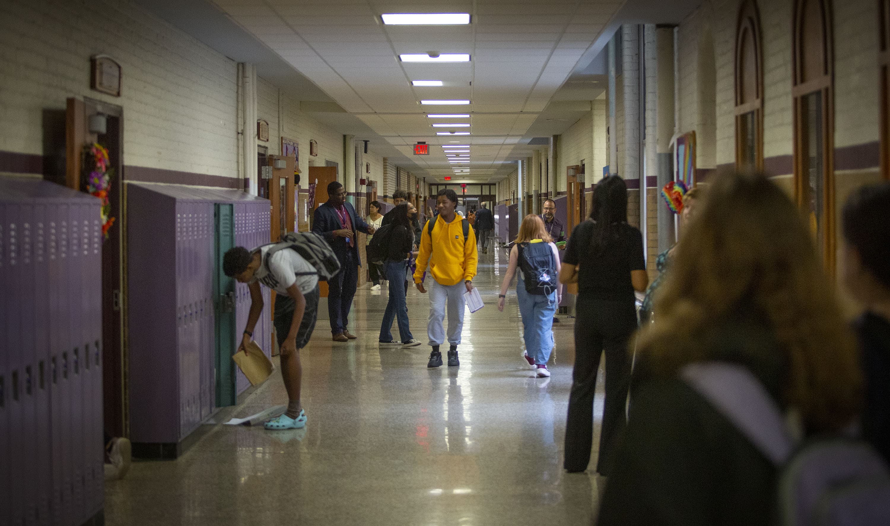 Students walk through a corridor at Boston Latin School between classes in September 2022. (Robin Lubbock/WBUR)