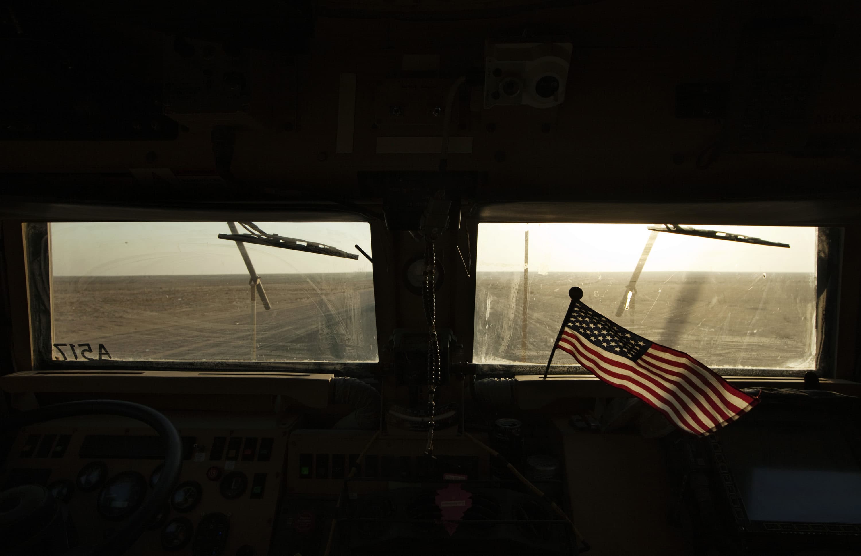 The last convoy of U.S. soldiers pulled out of Iraq, ending nearly nine years of war that cost almost 4,500 American and tens of thousands of Iraqi lives and left a country still grappling with political uncertainty. (Lucas Jackson, Pool/AP)